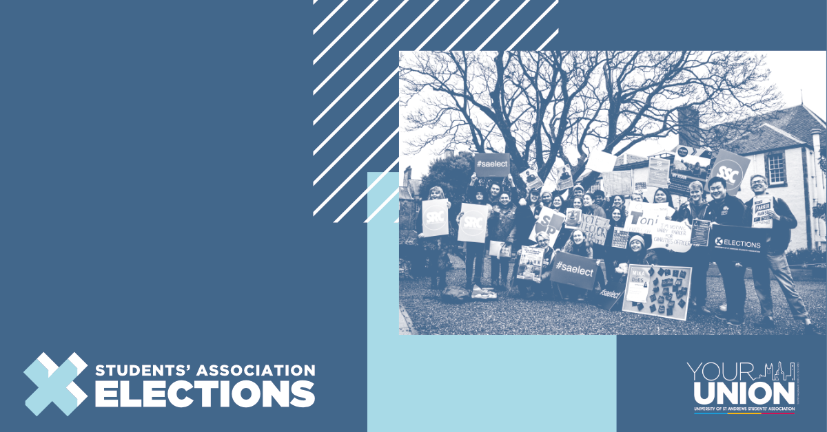 A group of students stand outside holding election banners.