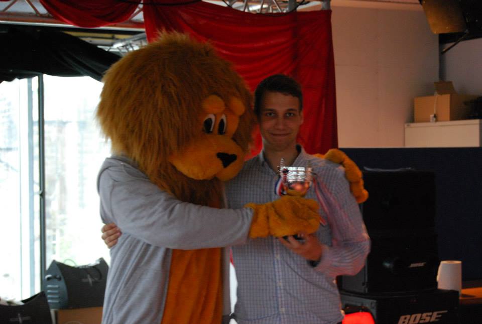 Rory McLion gives the Hall Champions League trophy to Robin Nabel, the Andrew Melville Hall Senior Student 2013-14